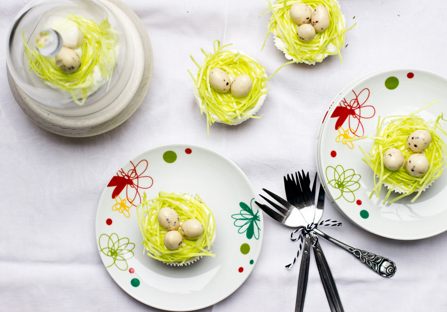 Make this cute poppy and carrot cupcake recipe for an eatable easter table decoration.