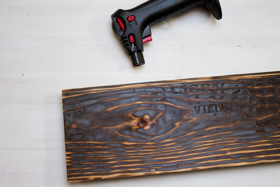 how to torch a wooden board with household materials to get an used look.